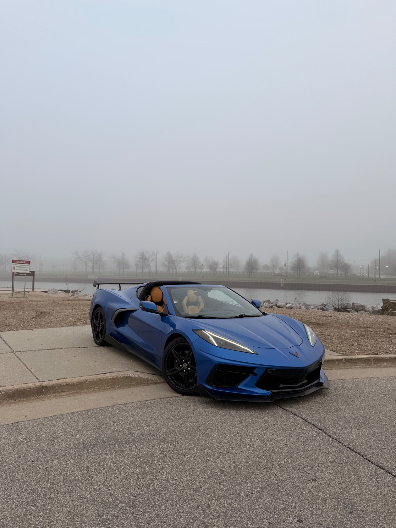 Blue 2023 Corvette C8 convertible on the Milwaukee lakefront